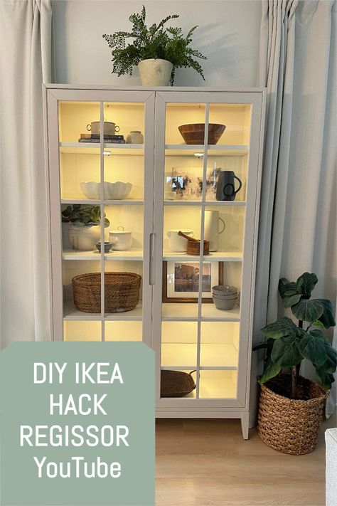 IKEA HACK on the Regissor Cabinet. A beautiful transformation using only paint, trim and puck lights! A knock off of high end cabinets that we see from Crate & Barrel and Studio McGee! DIY HACK // IKEA HACK // HUTCH MAKEOVER // CABINET TRANSFORMATION raeannemacklin.com Ikea Glass Cabinet Kitchen, Fabrikor Cabinet Ikea Hacks, Crate And Barrel Hacks, Ikea Regissor Cabinet, Ikea Rudsta Hack, Regissor Ikea Cabinet, Ikea Regissor Hack, Regissor Ikea Hack, Rudsta Ikea Hacks