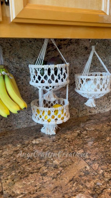 Macrame fruit baskets, banana hangers, and fruit hammocks are available on my Etsy. AngsCraftsnCreations. #macrame #macramefruitbasket #macramebasket #macramehanger #macramehanging #fruitbasket #macrameartist #bohokitchen #bohomacrame #angscraftsncreations | AngscraftsnCreations Macrame | INOSSI · Someone Macrame Fruit Basket, Fruit Hanger, Fruit Baskets Diy, Hanging Baskets Diy, Fruit Hammock, Banana Hanger, Macrame Basket, Diy Hammock, Hanging Fruit Baskets