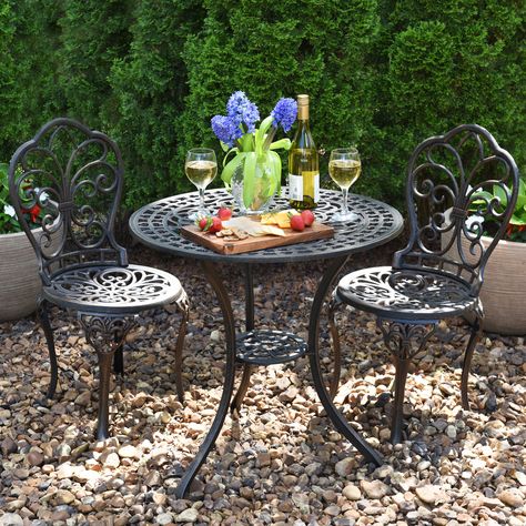 Relax the right way with a beautiful bistro set. Cast Iron Patio Furniture, Iron Bistro Set, Cast Iron Garden Furniture, Bistro Patio, Garden Nook, Iron Patio Furniture, Goth Garden, Bistro Table Outdoor, Aluminum Patio Furniture