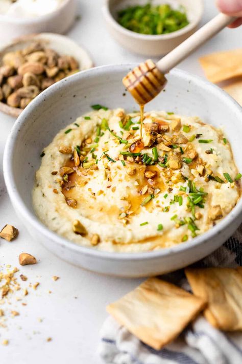 Dive into a blend of savory and sweet flavors with this incredible Baked Hot Honey Feta Dip recipe. Made with feta, cream cheese, hot honey, pistachios, and chives, it's perfect for game day or enjoying as a flavorful appetizer! Feta Honey Dip, Hot Honey Cream Cheese Dip, Honey Feta Dip, Honey Feta, Feta Honey, Honey Appetizers, Cauliflower Dip, Filling Snacks, Feta Dip