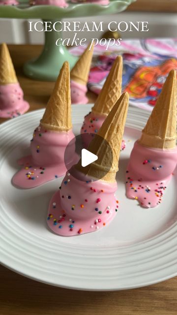 Sheri Wilson on Instagram: "Melting Ice-cream Cake Pops ☀️ the perfect easy treat to make for a summer party or icecream social! This is also a really one fun to make with kids!   Ingredients: -1 box vanilla cake, baked  -1/2 cup vanilla frosting -pink chocolate melts -rainbow sprinkles  -mini icecream cones  1. Combine the cake, frosting and sprinkles in a large bowl and mix until a dough has formed. (Add sprinkles at the end if using a hand mixer) 2. Scoop out small amounts and roll into balls. Allow them to set in the fridge until firm- about 1 hour. 3. Dip into melted chocolate, then place onto parchment paper- allowing the chocolate to drip at the bottom to look like melted icecream. Add sprinkles before the chocolate has set completely.  #cakepops #icecream #icecreamcone #cakepop #ea Melted Ice Cream Cake Pop, Cake Ball Ice Cream Cones, Ice Cream Cone Cake Pops Tutorial, Melting Ice Cream Cake Pops, Cake Pops In Ice Cream Cones, Mini Ice Cream Cone Cake Pops, Easy Treats To Make And Sell, Birthday Cakepops Ideas, Cake Pop Cones