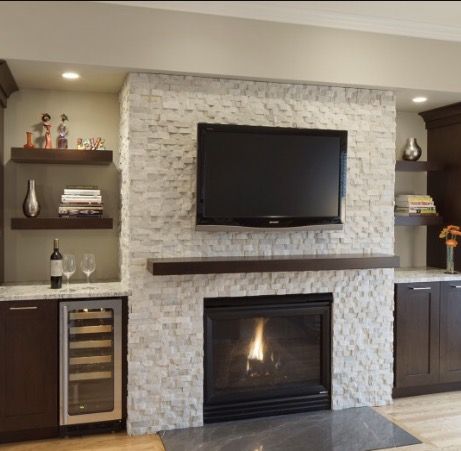 Contemporary Family Rooms, Brick Fireplace Wall, Wood Fireplace Surrounds, Built In Around Fireplace, Built In Wine Cooler, Contemporary Family Room, Living Room Tiles, Fireplace Remodel, Trendy Living Rooms