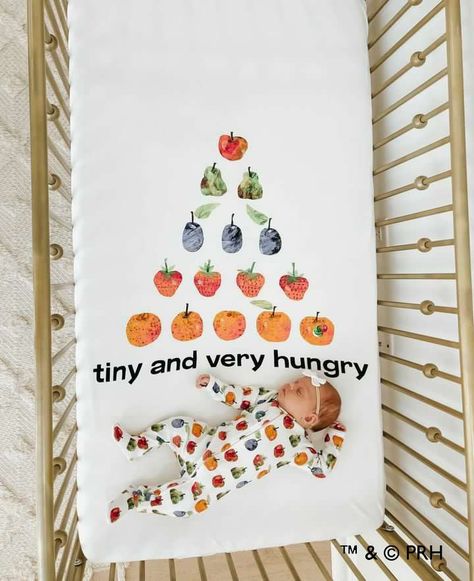 Young baby girl sleeping in crib, wearing 2-way zipper footie in fruit print and laying on crib sheet in the very hungry print Eric Carle Nursery, The Very Hungry Caterpillar Nursery, Hungry Caterpillar Room Decor, Caterpillar Nursery, Very Hungry Caterpillar Crochet Blanket, Hungry Caterpillar Nursery, Organic Crib Sheets, Crib Toddler Bed, Organic Cotton Clothing