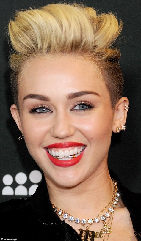 Mind the gap: Miley Cyrus showed off a new eye-catching accessory as she sported a gold grill at the MySpace launch event Miley Cyrus 2013, Girl Grillz, Miley Cyrus News, Grillz Teeth, Gold Grill, Celebrity Smiles, Veneers Teeth, Grills Teeth, Gold Teeth