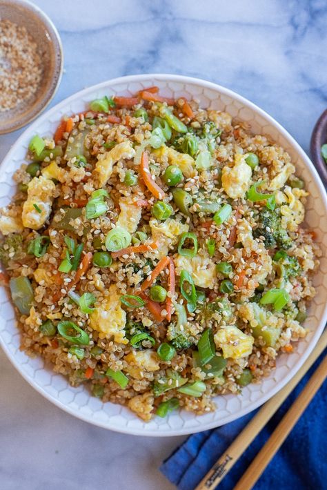 This is the Easiest Quinoa Fried Rice Recipe! Frozen veggies are used to cut down on time and money, so this protein packed vegetarian quinoa fried rice is perfect for a last minute dinner or lunch! Enjoy as a main dish with some extra tofu, or eat as a side dish to your favorite protein. #friedrice #quinoarecipe #quinoafriedrice #easydinner #frozenvegetables #vegetarian Quinoa Fried Rice Recipe, Quinoa Fried Rice, Easy Quinoa, Vegetarian Quinoa, Sides Recipes, Rice Recipes For Dinner, Gluten Free Soy Sauce, Authentic Chinese Recipes, Easy Weeknight Dinner