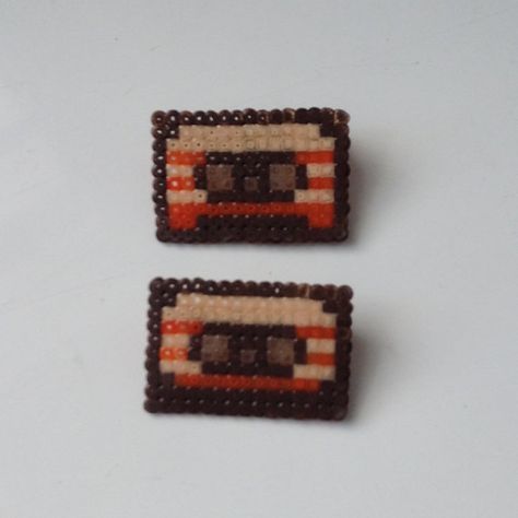 Guardians Of The Galaxy Awesome Mix Vol. 1 Tape Perler https://www.etsy.com/listing/249849197/guardians-of-the-galaxy-inspired-awesome?ref=shop_home_active_20 Guardians Of The Galaxy Perler Beads, Galaxy Perler Bead Patterns, Awesome Mix Vol 1, Hammer Beads, Galaxy Blanket, Kandi Perler, Hama Art, Perler Ideas, Pearl Beads Pattern