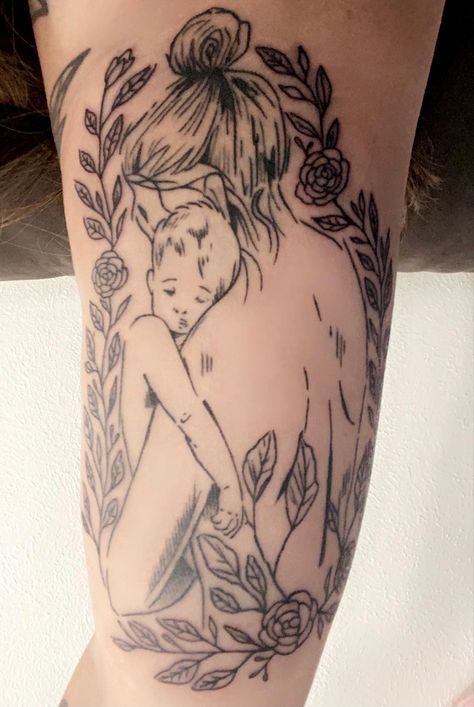 Tattoo of a mom holding her baby surrounded by leaves with 4 flowers to represent my children and 2 flower buds to represent my 2 angel babies that never got to bloom Mother Of Two Tattoo, Mother And Child Tattoo, Mother And Son Tattoo, Two Tattoo, Child Tattoo, Breastfeeding Tattoo, Motherhood Tattoos, Son Tattoo, Mom Tattoo Designs