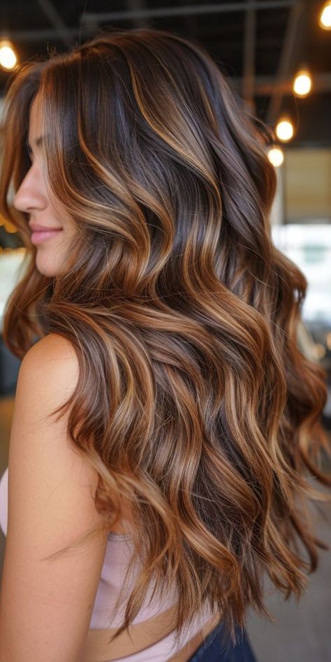 Discover the beauty of caramel balayage hairstyles and haircuts with these stunning examples. From subtle caramel highlights to bold balayage techniques, these looks are sure to turn heads. Whether you prefer a natural sun-kissed effect or a more dramatic contrast, caramel balayage offers versatility and dimension to any hairstyle. Elevate your look with these gorgeous caramel tones today! #CaramelBalayage #HairInspiration #BalayageHair #TrendyHairstyles Bayalage Brunette Caramel Honey Short, Dark Root Caramel Balayage, Caramel Balayage Long Hair Brunettes, Caramel Brown Ombre Hair, Caramel Brunette Balayage Hair, Chocolate Brown With Caramel Balayage, Auburn Carmel Balayage, Caramel Hair Ideas, Brunette With Red Highlights Caramel