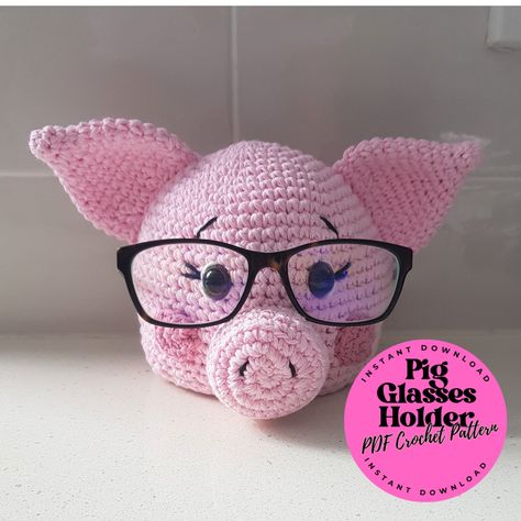 Pig Glasses Holder - PDF Crochet Pattern This is a pattern only - not the finished item itself. However, I do sell the finished glasses holder on a separate listing.  Available in English only Using medium worsted yarn 10 ply yarn and a 3 mm hook, the glasses holder measures approx. 13cm (5 inches) tall. This pattern is written in American crochet terminology. PDF pattern is automatically downloadable once payment is processed. I don't accept returns, exchanges or cancellations. But please conta Glasses Holder Crochet Free Pattern, Crochet Eyeglass Holder, Crochet Glasses Holder, Disney Crochet, Crochet Terminology, Disney Crochet Patterns, American Crochet, Crochet Pig, Crochet Eyes