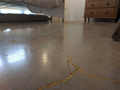 Dark Stained Concrete Floors, Kintsugi Concrete Floor, How To Fix Cracked Tile Floor, How To Do Polished Concrete Floors, Wabi Sabi Floor, Grind And Seal Concrete Floors, How To Repair Sunken Concrete, Small Dark Bathroom, Gold Concrete