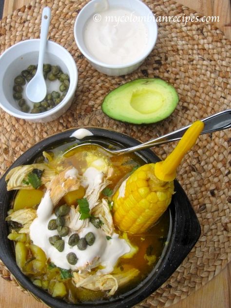 AJIACO BOGOTANO (COLOMBIAN CHICKEN AND POTATO SOUP) via mycolombianrecipes.com. I ate this in Bogota on Christmas Eve and it was amazing. I made this version for my family last Christmas Eve and it was delicious. Columbian Chicken, Easy Colombian Food Recipes, Colombian Soup Recipes, Colombian Soup, Ajiaco Soup, Colombian Chicken Stew, Colombian Chicken, Chicken And Potato Soup, Colombian Sancocho