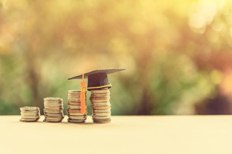 Tuition payment or tuition fee or expense for graduate study abroad program concept : Black graduation cap on stacks of coins, depicts fees charged by education institution for instruction or services Australia School, Black Graduation, Student Numbers, Private Schools, School Fees, Education Policy, Target Market, Education Level, Tuition Fees