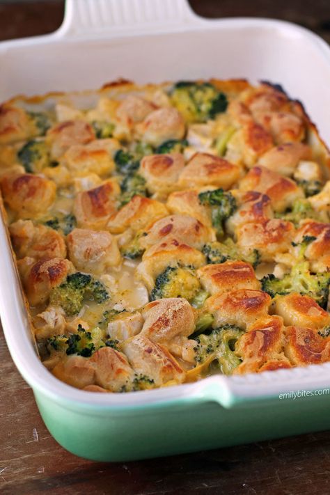 This Bubble Up Cheesy Chicken and Broccoli Bake is pure comfort food, lightened up! Easy and cheesy for just 350 calories or 7 WW Freestyle SmartPoints! www.emilybites.com Chicken Broccoli Biscuit Bake, Ww Broccoli Casserole, Buffalo Chicken Bake With Broccoli, Dump And Bake Cheesy Chicken And Rice With Broccoli, Bubble Up Recipes, Chicken Broccoli Bubble Up Bake, Bubble Up Chicken Pot Pie Ww, Ww Casserole, Chicken And Broccoli Bake