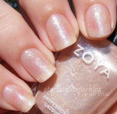 Zoya ~ Glimmer A soft, pink-toned nude shade packed with glimmering gold and silver glitter. Makes a very glamorous French manicure. Color Family French Finish Metallic Intensity 1 ( 1=Sheer - 5=Opaque ) Tone Warm Original Collection Sparkle DISCONTINUED French Manicure Glitter, Manicure Gold, Gel Manicure Diy, Gel Manicure Designs, French Manicure Acrylic Nails, Gel Manicure Colors, Pink French Manicure, Gel French Manicure, Glitter French Manicure