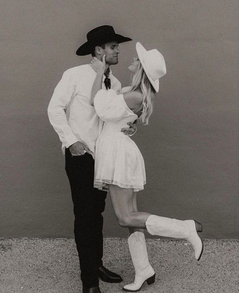 Cowboy Wedding Photoshoot, Guys Outfits For Engagement Pictures, Courthouse Wedding Western, Courthouse Wedding Dress Western, Cowboy Vegas Wedding, White Dress With Cowboy Boots Engagement, Bridal Dress With Cowboy Boots, Engagement Photos Outfits Cowboy Boots, Vegas Cowboy Wedding