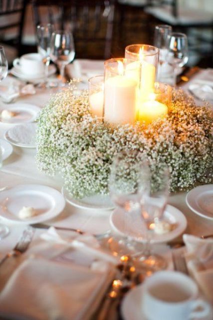 a baby's breath wreath with candles in tall glass candle holders Winter Wedding Decorations Diy, Diy Winter Wedding, Lantern Centerpiece Wedding, Lantern Centerpieces, Candle Wedding, Winter Wedding Decorations, Babies Breath, Country Theme, December Wedding