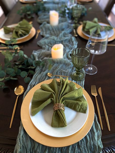 Dinning table set up. Dinning table decor. Green and gold dinnerware. Wine glasses. Vintage wine glasses. LED Candles. Follow my shop @Mrs.JayP on the @shop.LTK app to shop this post and get my exclusive app-only content! #liketkit #LTKunder100 #LTKFind #LTKhome @shop.ltk Green Table Settings, Braided Placemats, Wine Glasses Vintage, Dinning Table Set, Green Dinnerware, Fall Dinner Party, Green Napkins, Gold Dinnerware, Vintage Wine Glasses