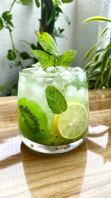 Ronak Choudhary on Instagram: "10M+views 🤩 🥝 Kiwi Mojito 🥝 🍹 Summer cool 😎 🥝 Recipe 👇🏻👇🏻👇🏻 . 1 kiwi . Lemon slices 3-4 . Mint leaves 7-8 . Sugar . Ice cubes . Soda/Tonic water . Water 🥝 And Enjoy 😉 🥝 🥝 Follow @hungerherb Support @hungerherb 😻 Tag @hungerherb 🏷 🥝 #kiwi #mojito#kiwimojito #kiwifruit #drinks #summervibes #summerdrinks #fruitdrinks #blog #blogger #trendingreels #reelitfeelit #trendingsongs #picoftheday #picture #instadrink #recipes #creative #creator #indian #indi Kiwi Mojito, Kiwi Juice, Lemon Slices, Cheese Ball Recipes, Natural Drinks, Christmas Menu, Kiwi Fruit, Summer Cool, Water Water