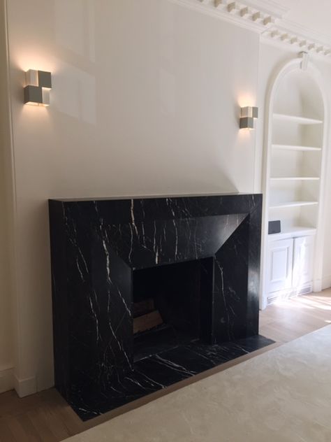 custom fireplace surround done in Nero Marquina marble Black Quartz Fireplace Surround, Marble Slab Fireplace, Slab Fireplace, Wood Fireplace Surround, Marble Fireplace Surround, Marquina Marble, Nero Marquina Marble, Black Fireplace, Marble Fireplace