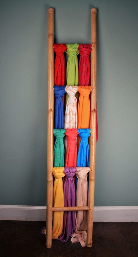 How to display scarves: merchandising tips | Italian E-Learning Fashion School How To Display Scarves In A Boutique, Diy Clothes Ladder, Display Scarves, Scarves Display, Clothes Ladder, Yard Sale Tips, Clothes Shop Design, Book Stairs, Denim Display