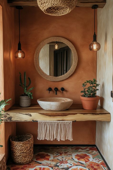 Elevate your space with boho vibes and modern bathroom ideas! This rustic sink and natural decor create a warm, inviting atmosphere. Incorporate plants and woven elements for a touch of greenery and texture. #InteriorDesign #BohoBathroom #ModernBathroomIdeas Boho Country House Ideas, Boho Bathroom With Plants, Desert Color Bathroom, Desert House Bathroom, Terracotta Half Bathroom, Desert Oasis Bathroom, Bathroom Decor Ideas White Cabinets, Mid Century Modern Boho Bathroom, Spanish Boho Bathroom