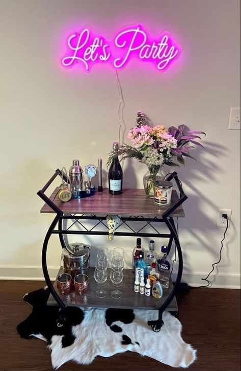 Solid Foundation Travels Neon Sign Above Bar Cart, At Home Bar Cart Ideas, Home Barcart Ideas, Wine Bar Cart Ideas, Mini Bar In Apartment, Bar Cart In Apartment, Neon Signs Bedroom Decor Ideas, Wine Bar Decor Ideas Home, Neon Sign In Living Room