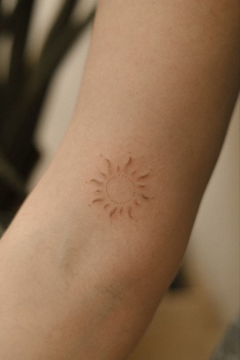 Sun Rays Tattoo Shoulder, Setting Sun Tattoo, Delicate Sun Tattoo, Rays Of Sunshine Tattoo, Light Brown Tattoo, Yellow Tattoos, Brown Ink Tattoo, Simple Sun Tattoo, Lil Tattoos