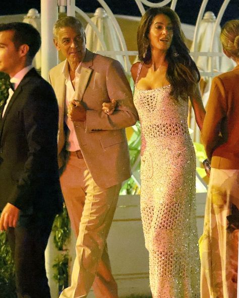 Amal Clooney may be approaching a decade of marriage to her husband George, but that won’t stop her from enjoying some fabulous bridal fashions. When it comes to her vacation style, vintage acolyte Clooney is usually liable to pull a rare piece from her impressive archive however last night’s look was was one from the very recent past: 2023 to be exact. Tap the link in our bio for details. Amal Clooney Wedding, White Crochet Dress, Beachy Dresses, White Slip Dress, Spanish Learning, Amal Clooney, Amy Jackson, Crochet Maxi, Celebrity Moms