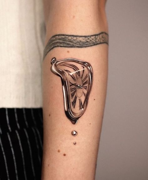 Small Surealism Tattoo, Surrealist Tattoo Ideas, Metalic Tatoos, Surealism Tattoo Ideas, Liminal Tattoo, Hyperrealism Tattoo, Dali Clock Tattoo, Chrome Tattoo Designs, Melting Clock Tattoo