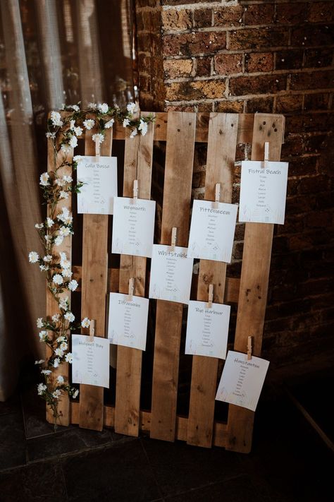 Wooden Table Decor Wedding, Rustic Wedding Table Plan, Pallet Seating Chart Wedding, Pallet Table Plan, Wedding Pallet Ideas, Seating Plan Wedding Rustic, Wooden Pallet Wedding, Pallet Wedding Decor, Whitstable Beach