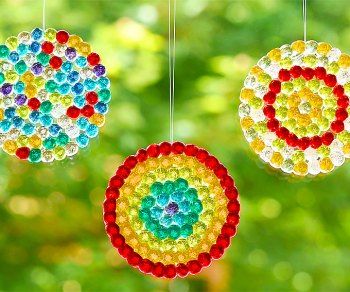 Glass Bead Suncatcher | DIY Suncatchers with Glass Beads 3s Preschool, Plastic Beads Melted, Bead Suncatchers, Simple Arts, Peppermint Candy Ornaments, Light Catchers, Cousin Camp, Suncatcher Diy, Glass Bead Crafts