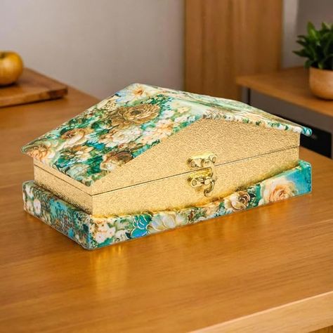 Material : Wooden covered with decorative fabric material. | Closure Type: Toggle Latch Catch Lock
Package Contain: 1 Hut Shape Decorative Shagun/Cash Gift Box (Multicoloured, Design & Color as per Availability)
Size (LXBXH): 21 X 10 X 9 CM Approx (OUTER) & 19.5 X 8.5 X 5 CM Approx (INNER)
Usages: Multipurpose box can be used for gifting cash as wedding shagun for the groom or bride, roka ceremony, engagement, or for gifting bracelets, payals, return gifts, Jewellery, and other precious items. Cash Box For Wedding, Roka Ceremony, Cash Box, Return Gifts, Cash Gift, Return Gift, Design Color, Fabric Decor, Bracelet Gift