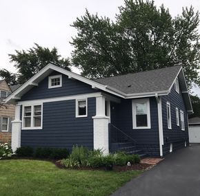 Evening Dove exterior paint color with white trim | Bungalow cottage 1930's | Dark blue navy home | Gray roof Navy Blue Houses, Exterior Paint Schemes, Exterior House Siding, Bungalow Cottage, White Exterior Houses, Best Exterior Paint, House Paint Color Combination, House Trim, Bungalow Exterior