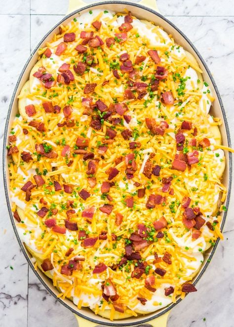 Learn how to make these delicious Loaded Scalloped Potatoes with lots of bacon and cheddar cheese. Comfort food at its finest, easy to make and you'll end up with cheesy, creamy, tender potatoes every single time! #scallopedpotatoes Bacon Scalloped Potatoes, Casserole Sides, Loaded Scalloped Potatoes, Scalloped Potatoes With Bacon, Scalloped Potato Casserole, Homemade Scalloped Potatoes, Casserole Ideas, Scalloped Potatoes Recipe, Jo Cooks