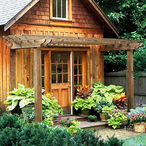 This is the exact look I want for our new pergola attached to the new shed...hosta and all! Patio Extension, Rustic Front Porch, Pergola Attached To House, Pergola Plans, Pergola Kits, Pergola Patio, Cabins And Cottages, Garden In The Woods, House Roof