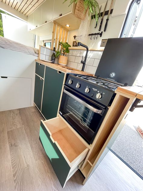 Beautiful scandi ply wood kitchen with oven, sink and fridge, plenty of storage Camper Van Kitchen Storage, Campervan Cupboard Ideas, Van Conversion Storage, Van Build Kitchen, Swb Van Conversion, Caravan Kitchen Ideas, Camper Kitchen Storage, Campervan Sink, Campervan Kitchen Ideas