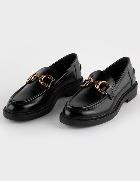 Steve Madden Swamie Loafers. Crafted With High-Quality Faux Leather, These Loafers Offer A Sleek And Polished Look That's Perfect For Any Occasion. Featuring Elegant Gold Buckle Detailing, These Loafers Add A Hint Of Glamour And Refinement To Your Ensemble. The Classic Loafer Silhouette Provides Timeless Appeal, While The Slip-On Design Ensures Easy On-And-Off Wear For Busy Days. Cushioned Footbed. Rubber Outsole. Crafted With All Man Made Materials. Imported. Tzniut Fashion, Womens Loafers Black, Womens Loafers, Loafers Outfit, Lug Sole Boots, Fame Dr, Black Loafers, Silver Shoes, Grey Pants