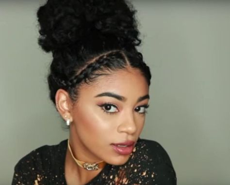 So some braiding skill is needed for this hairstyle, but once you have that locked down, you are good to go. See how Jasmine gets the look here. Really Cute Hairstyles, Hairstyle Braid, Cabello Afro Natural, Braided Top Knots, Haircut Tip, Braid Updo, Curly Hair Photos, Naturally Curly Hair, Hairstyles For Girls