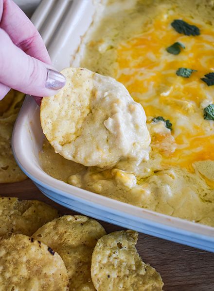 This green chile chicken enchilada party dip recipe is packed with flavor. Our Chugwater Chili Green Chili Seasoning adds a tasty green chile flavor when added with chicken, cheese, and diced green chilies in this easy party dip. You will be able to add this new dip recipe to your list of favorite recipes to serve at parties and get-togethers. What To Serve With Green Chili, Green Chile Chicken Dip, Green Chili Chicken Dip, Easy Dips To Make, Chili Seasoning Recipe, Green Chile Enchilada Sauce, Green Chile Chicken Enchiladas, Vegetable Dips, Green Chili Chicken