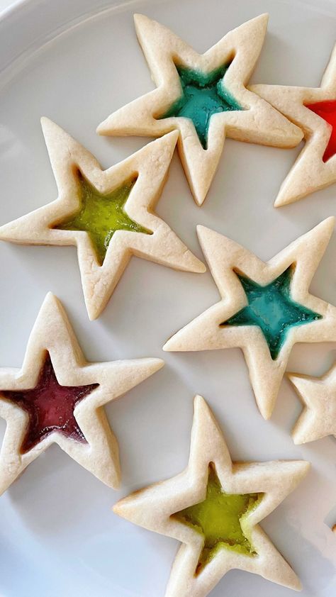 abeautifulmess on Instagram: Stained glass cookies! Fill holes in sugar cookies with crushed up jolly ranchers. They will bake into colorful, translucent "windows"… Glass Cookies, Jolly Ranchers, Stained Glass Cookies, A Beautiful Mess, Jolly Rancher, Crafty Kids, Cookie Box, Beautiful Mess, Stained Glass Window