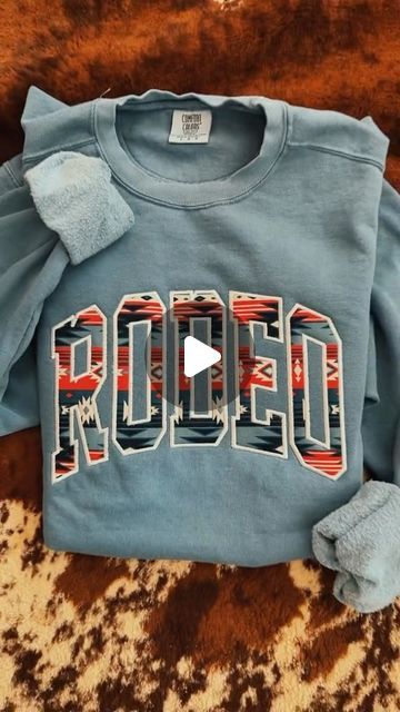 Teal Creek Boutique & Designs on Instagram: "Rodeo ❤️💙
•
•
•
#thisishowiwestern #westernfashion #westernstyle #rodeofashion #rodeostyle #thisishowwewestern #graphictee #embroidery #rodeo #dearrodeo" Trendy Relaxed Fit Rodeo T-shirt, Relaxed Fit Crew Neck T-shirt For Rodeo, Retro Crew Neck T-shirt For Rodeo, Graphic Print T-shirt For Rodeo, Rodeo Graphic Crew Neck T-shirt, Rodeo Fashion, Boutique Design, Rodeo, Western Fashion