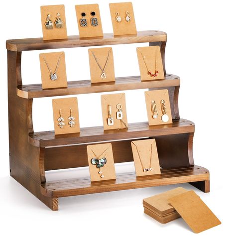 PRICES MAY VARY. Premium Material: The 4 tier earring display stand is crafted with high quality natural wood, it is steady when holding items, and come with 50 pcs thick and durable earring paper card. Dimensions after Assembly: 15.7" L x 12.6" W x 13.1" H. Perfect for displaying items at vendor events for both a great looking table and the functionality of having more vertical space. Easy to Assemble: This jewelry organizer stand is easy to put together in a few minutes, just fix the screws to Wood Earring Display, Market Tent, Display Earrings, Earring Holder Display, Tent Ideas, Farmers Market Display, Earring Display Stand, Jewelry Organizer Stand, Earring Display Stands