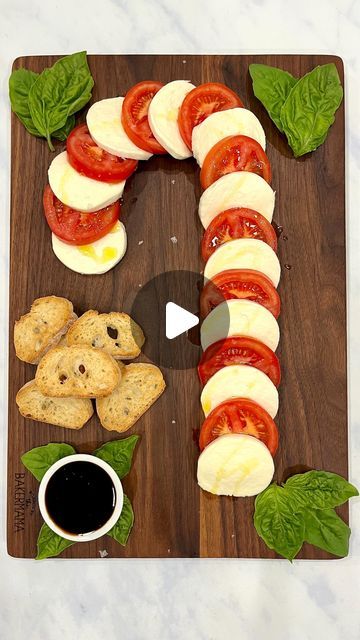 Maegan Brown ~ The BakerMama on Instagram: "❤️🤍 Candy Cane Caprese Board ❤️🤍 a simple and stunning way to serve an appetizer during the holidays! 🎄🍅🧀 It only requires a few ingredients and comes together in a matter of minutes so you can spend more time with your loved ones this holiday season. 

Comment “recipe” and I’ll DM you the link! or tap the link in profile @thebakermama for all the board building details. Follow for more festive recipes and ENJOY! ❤️ #TheBakerMama #BoardsByTheBakerMama

https://thebakermama.com/recipes/caprese-candy-cane-board/

#caprese #candycanecaprese #candycane #christmasappetizer #holidayappetizer #cheeseboard #cheeseplatter #christmascaprese #christmas #christmasfood #christmasrecipe #christmasideas #merrychristmas #candycane #christmassnacks" Candy Cane Caprese Board, Caprese Candy Cane, Caprese Board, Xmas Appetizers, Christmas Finger Foods, Party Food Bars, Building Details, Xmas Desserts, Festive Recipes