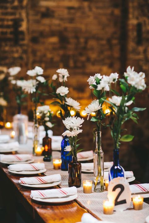 Clambake Wedding, Navy Rustic Wedding, White Flower Centerpieces, Rustic Flower Arrangements, Table Arrangements Wedding, Bottle Centerpieces, Table Centerpiece Decorations, Brown Bottles, Wedding Bottles