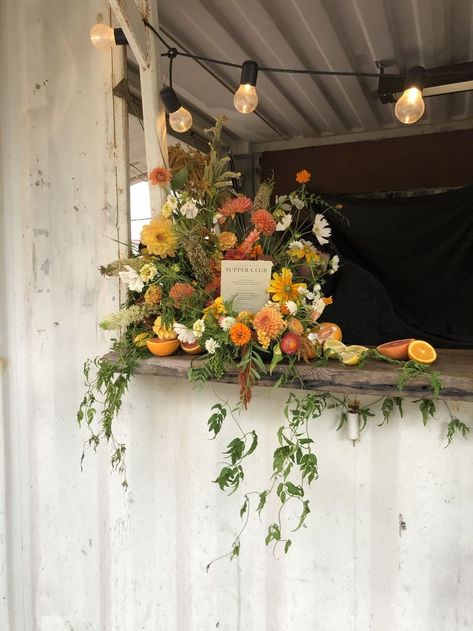 Bar menu and arrangement for pioneer works x chandon Bar Table Flower Arrangements, Flower Arrangement With Oranges, Centerpieces With Fruit And Flowers, Citrus Garland Wedding, Earth Tone Floral Arrangements, Citrus Floral Centerpiece, Floral Bar Decor, Flower Bar At Wedding, Centerpieces Wedding Unique