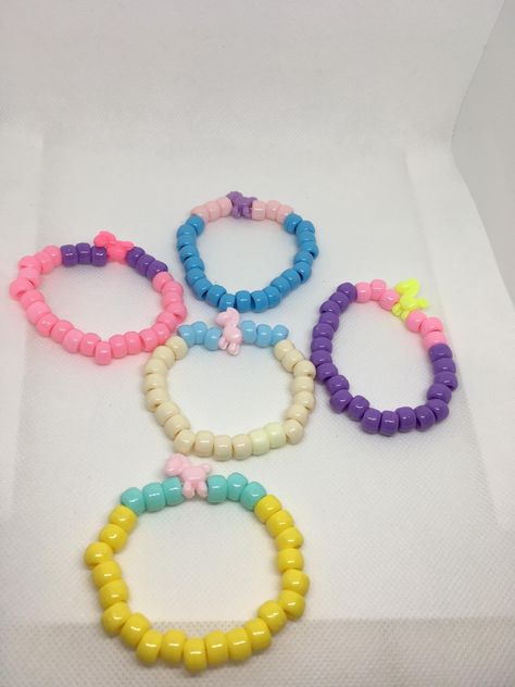 These cute little bracelet's come in 5 colors. Each come with a darling tiny pony. Each is 6 inches long or to what you want. These are made with a stretch elastic you pick from the color choice. (5 colors Available). As with everything in my shop If you're ever unhappy with anything you buy you can return it. You pay the shipping back as long as it's in still new condition. Returns are never a problem. Please message me if you have any problems or messages. I'll get back to you as soon as possi Pony Bead Bracelets, Pony Beads, Holiday Deals, School Crafts, Color Choices, Free Gifts, Jewelry Bracelets, Bracelet, Beaded Bracelets