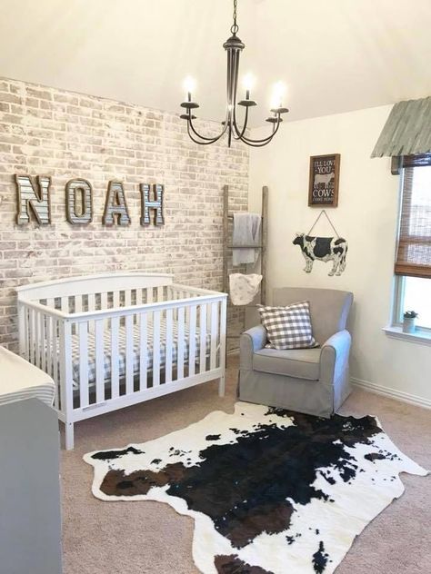 love the light brick accent wall for bedroom #BedroomForKidsAtticSpaces farmhouse cow themed very cute with chandelier Cow Nursery, Brick Accent Wall, Farmhouse Nursery, Baby Boy Room Decor, Nursery Room Design, Baby Boy Room Nursery, Nursery Room Inspiration, Baby Room Design, Rustic Baby