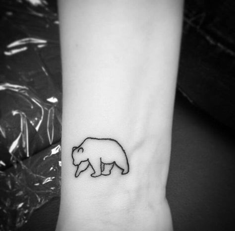 12+ Tiny Bear Tattoo Designs | PetPress Small Bear Tattoo, Baby Bear Tattoo, Black Bear Tattoo, Polar Bear Tattoo, Tattoo Line Art, Simple Wrist Tattoos, Bear Tattoo Designs, Cool Wrist Tattoos, Tattoo Wrist