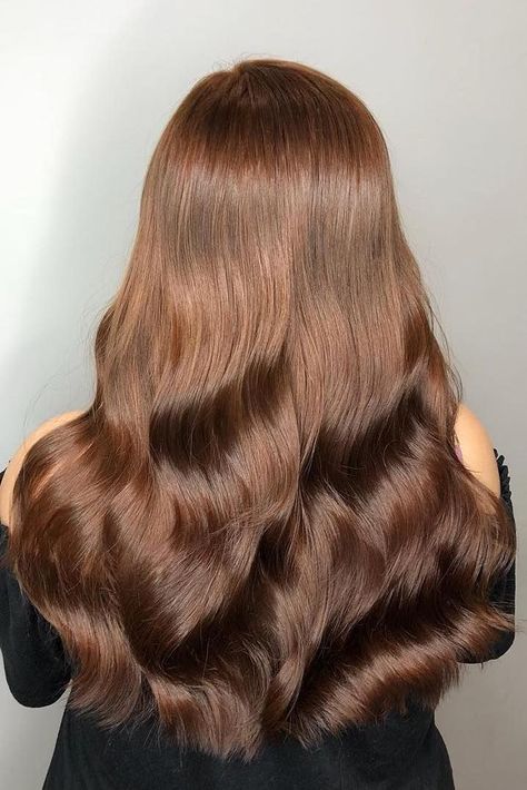 Glossy fall hair color inspo? Save this beautiful brunette hair look, with subtle golden tones, created by Kapille Hair. Chest Nut Brown Hair Color, Light Mahogany Brown Hair, Dark Golden Hair, Hazelnut Hair Color Brown Light, Solid Golden Brown Hair, Maple Hair Color, Light Brown Hair Gloss, Neutral Golden Brown Hair, Glossy Brown Hair