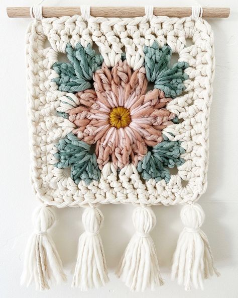 Caroline Langford - Floral Fiber Artist | My first completed embroidered floral granny square wall hanging!! 🤩🤩🤩 I’m going for “elevated cozy” and I am IN LOVE 😍 I was so excited… | Instagram Embroidered Granny Square, Granny Square Tapestry, Granny Square Wall Hanging, Crochet Granny Square Wall Hanging, Floral Granny Square, Crochet Tulip Wall Hanging, Crochet Floral Wall Hanging, Crochet Quilt Pattern, Kawaii Crochet